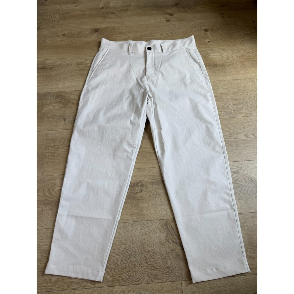 EUC Lululemon Men Size 34 Relaxed Tapered Trouser in the color Bone 28" inseam